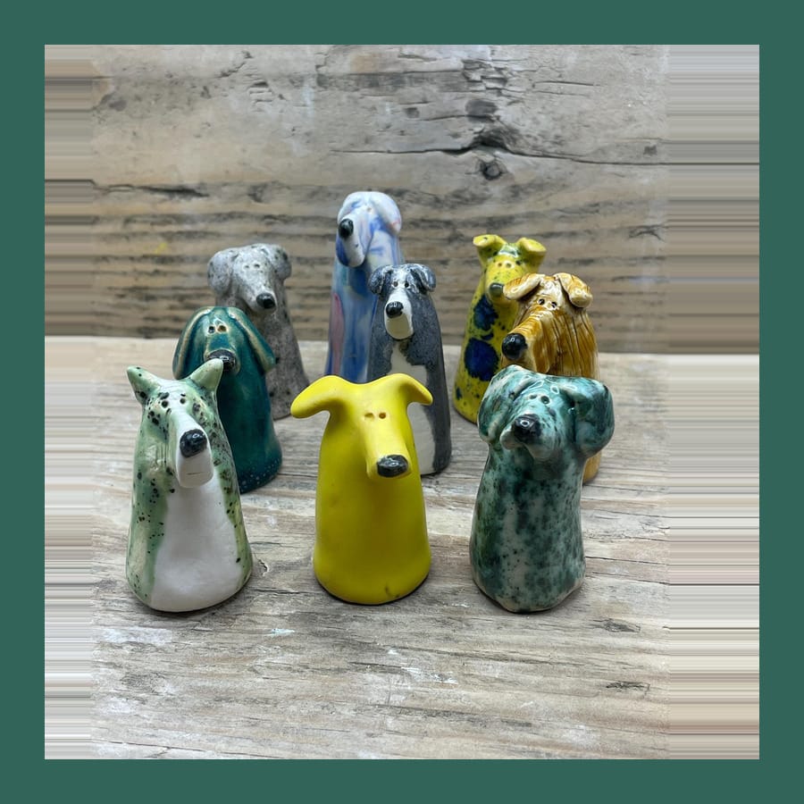 A batch of small hand-made glazed ceramic dogs by WoodyAndSpud, in mixed colours